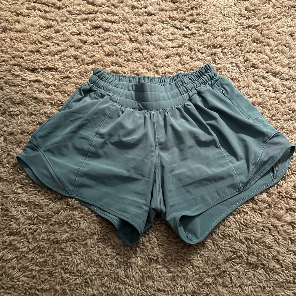 Lululemon hotty hot shorts 4” size 4 in a sage green color.